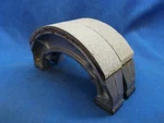 Suzuki 64410-14100. Oem Brake Shoe Set. Fits RM125(81-88) RM250(81-83). NP3789.. Fixed Price $33.95.