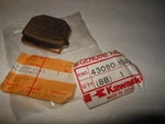 Nos Kawasaki KX125 KX250 KX80W Brake Pad 43050-1043. Fixed Price $19.99.
