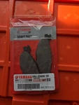 Nos Yamaha 5RU-25806-00-00 Brake Pad SCP250 YP400 XP500. Fixed Price $40.00.